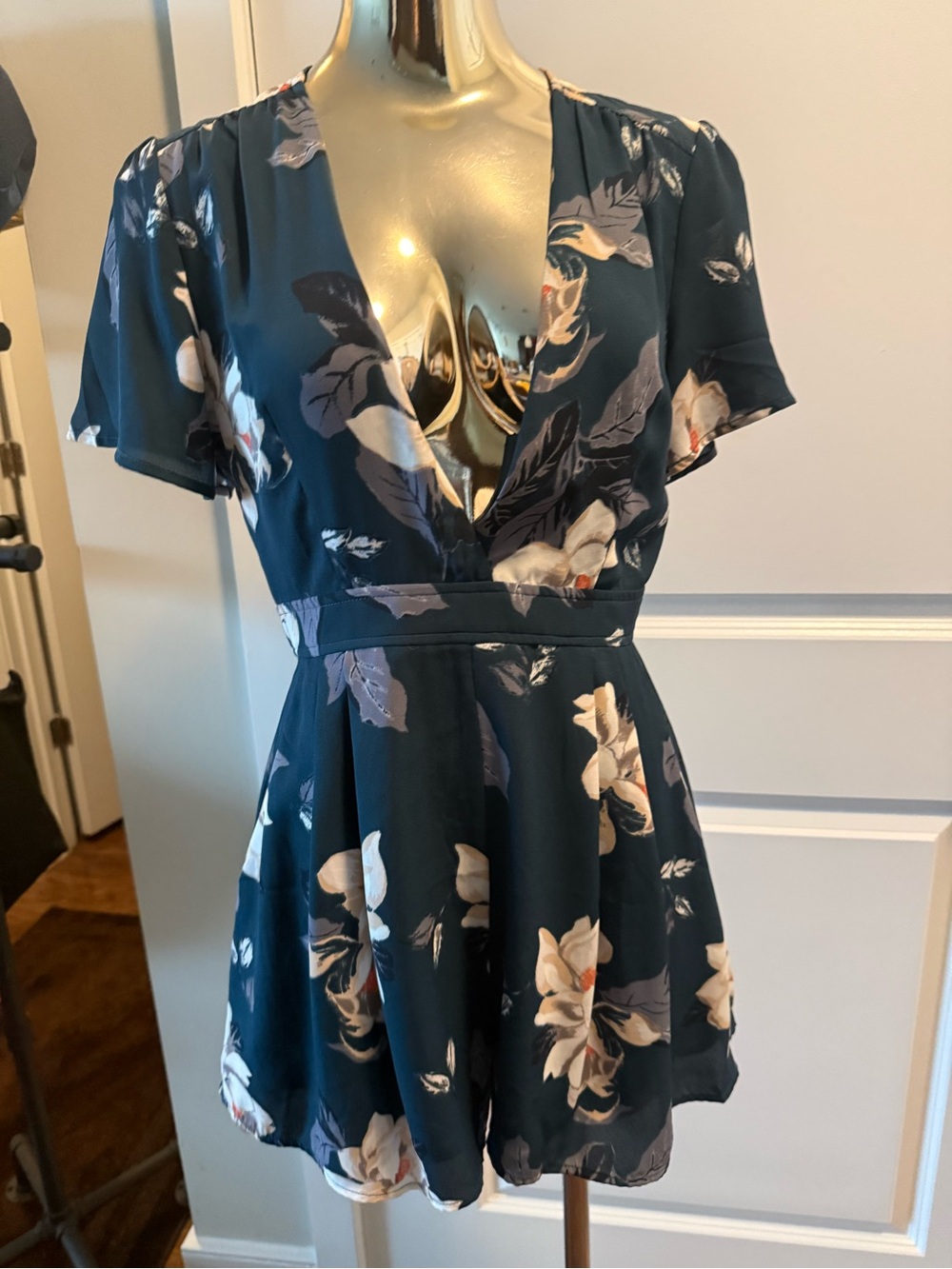Astr Floral Deep V-Neck Short Sleeve Romper in Navy and White